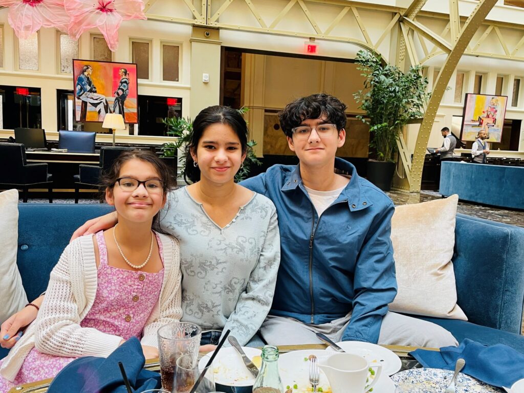 three children, Uma, Nadia and Kieran 