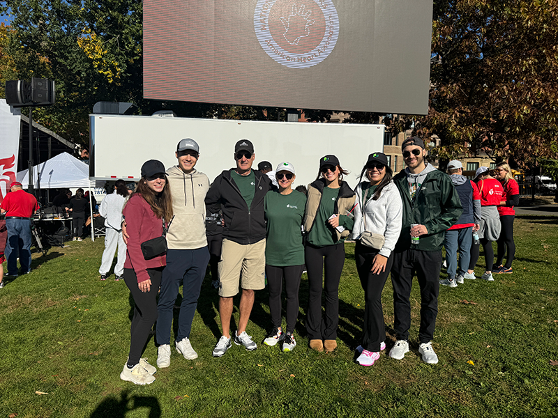 7 people pose for a photo at the Heart Walk