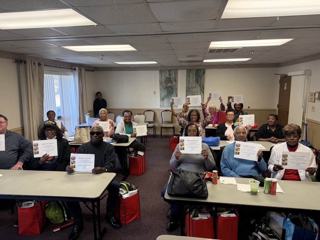 Healthy for Good participants holding up completion certificates