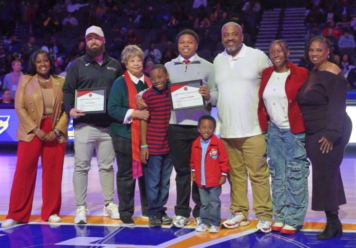 Ameer Chambers, cardiac arrest survivor, with his family and friends at the MEAC Basketball Tournament