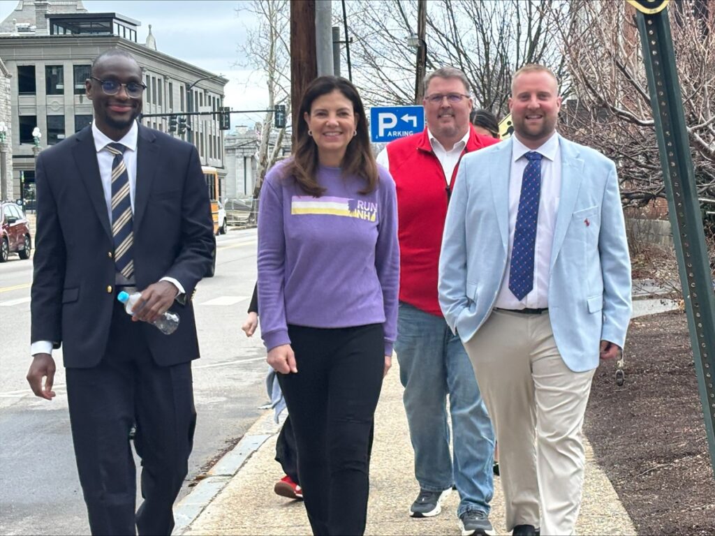 Group walking with Governor Ayotte